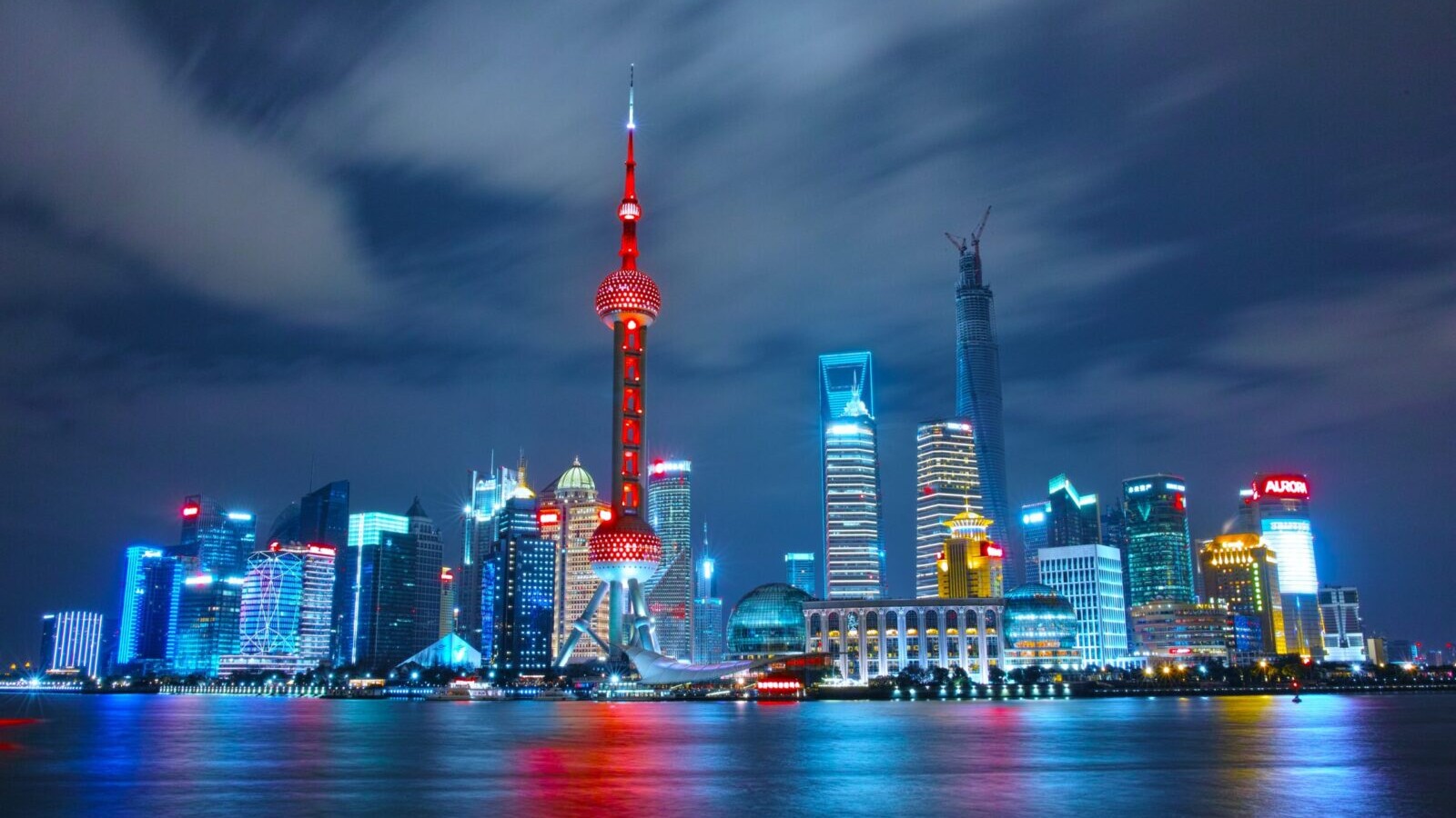 city landscape of china blue and red glow over water