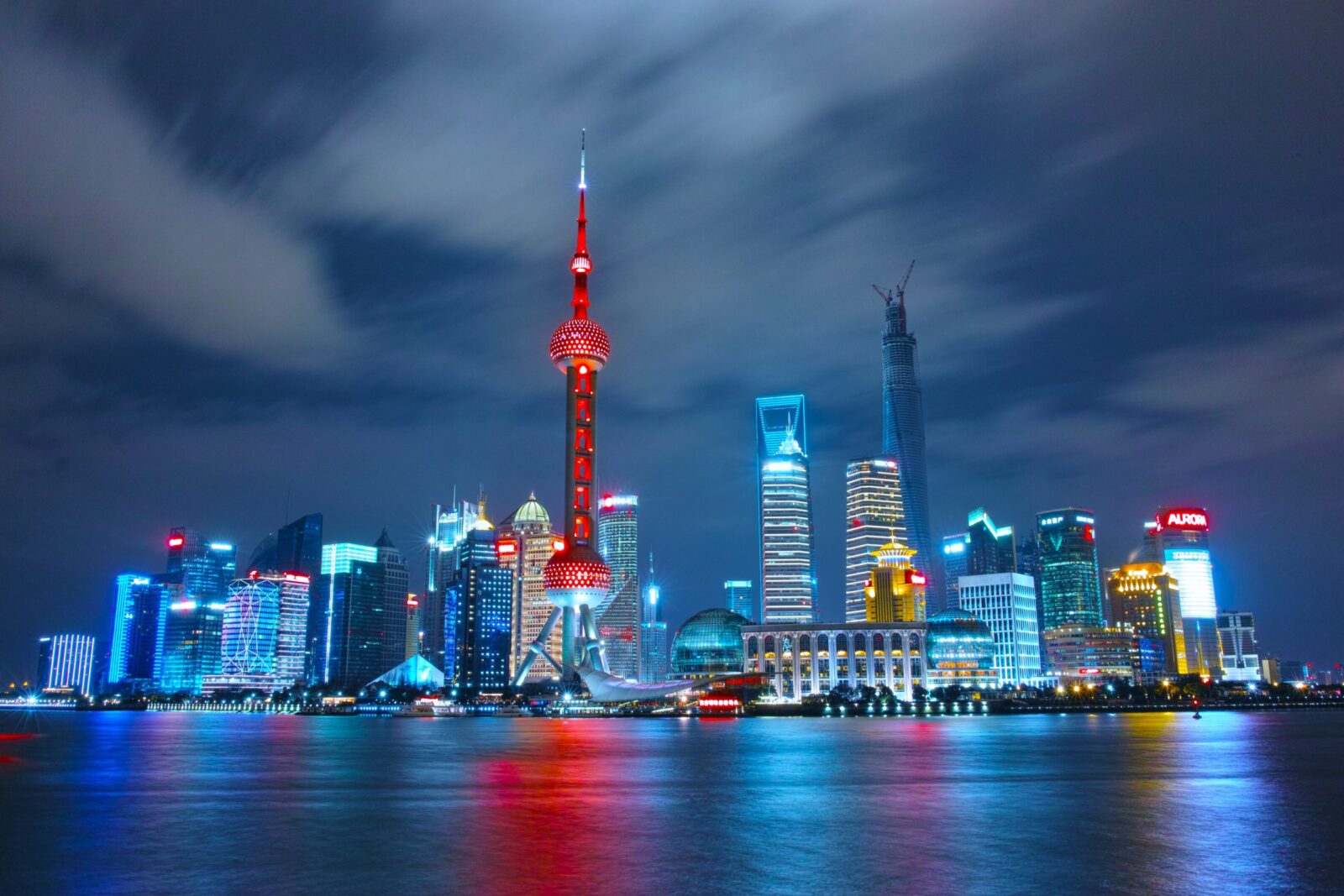 city landscape of china blue and red glow over water