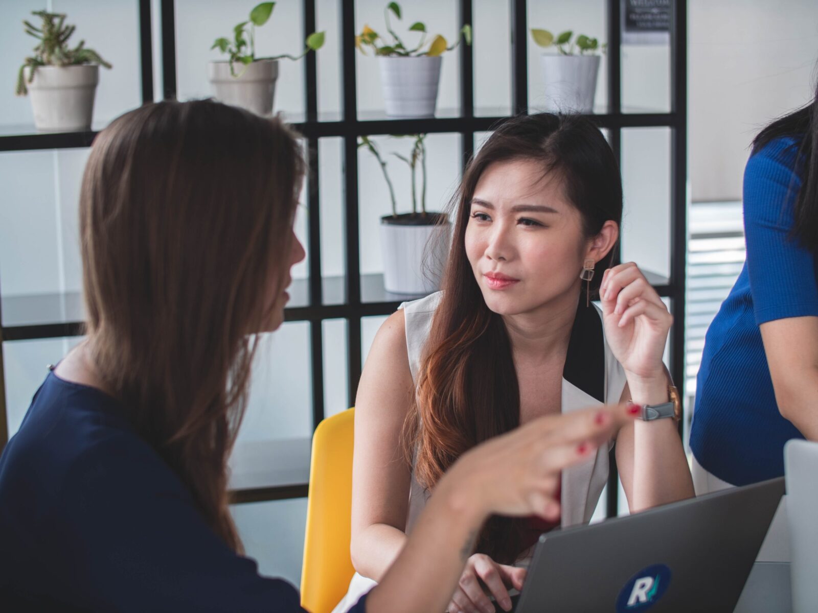 two diverse women in conversation