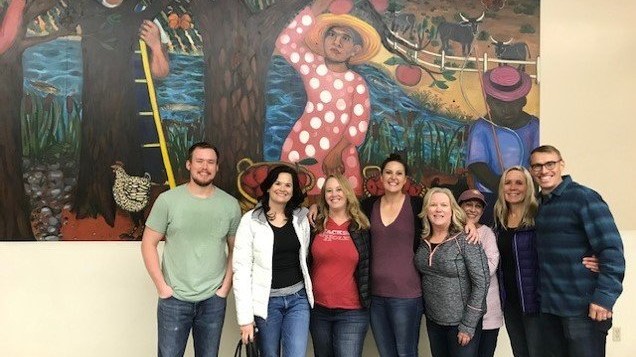 NEPC team members in a group photo at the Portland food bank.