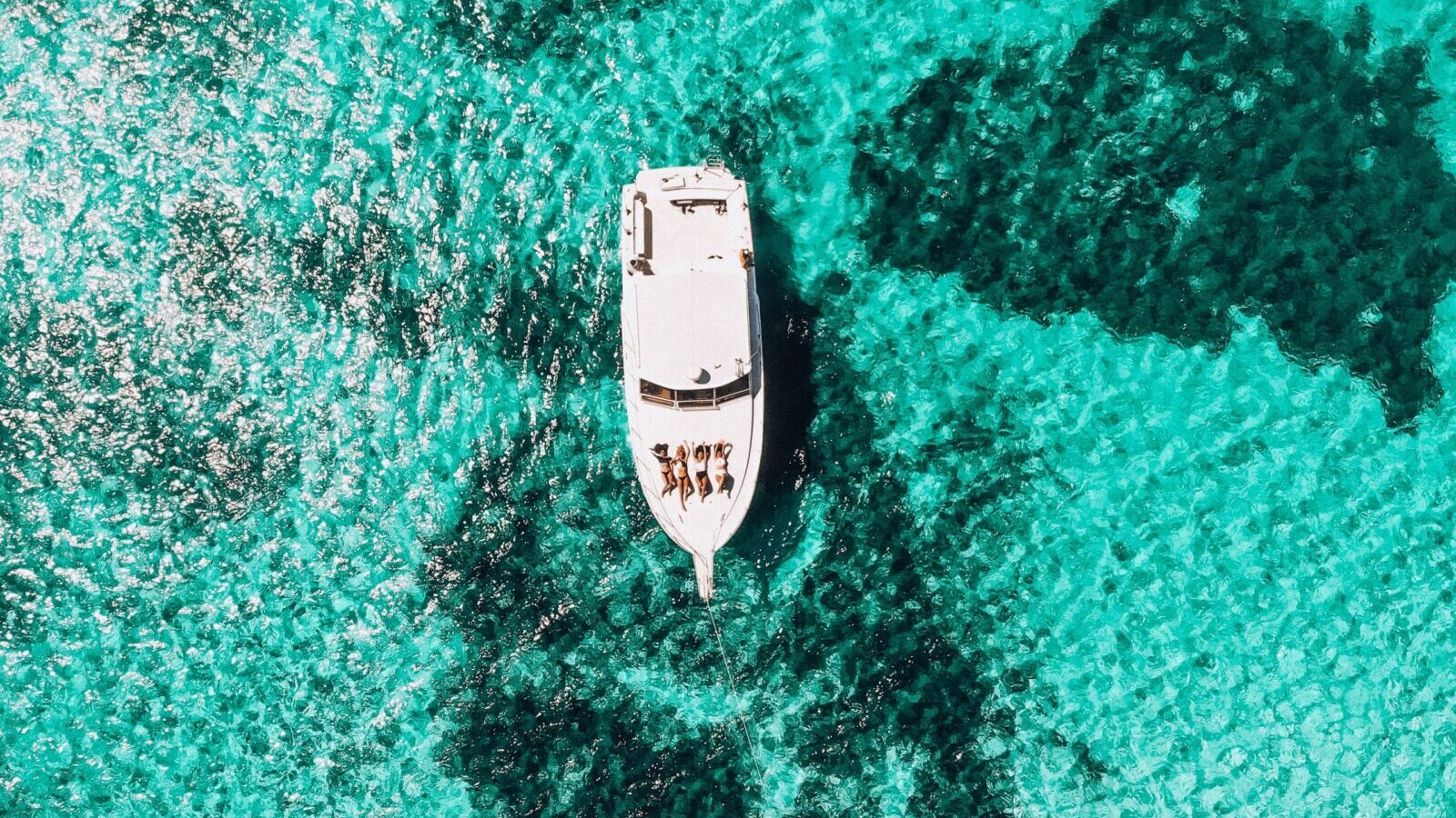 yacht in blue green water