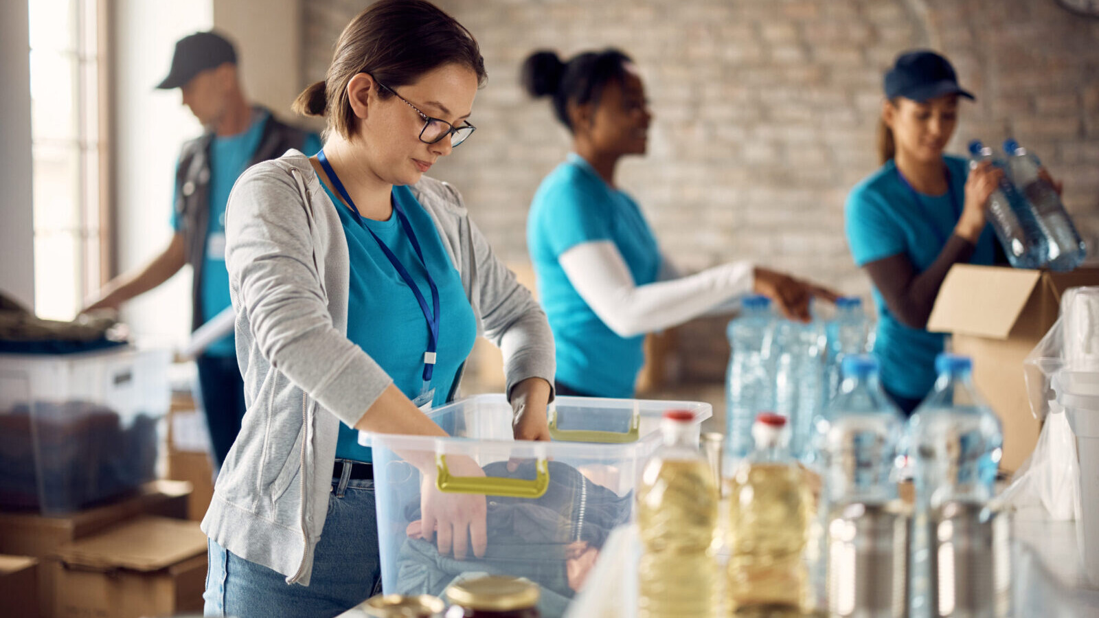 Young woman volunteering at charitable foundation.