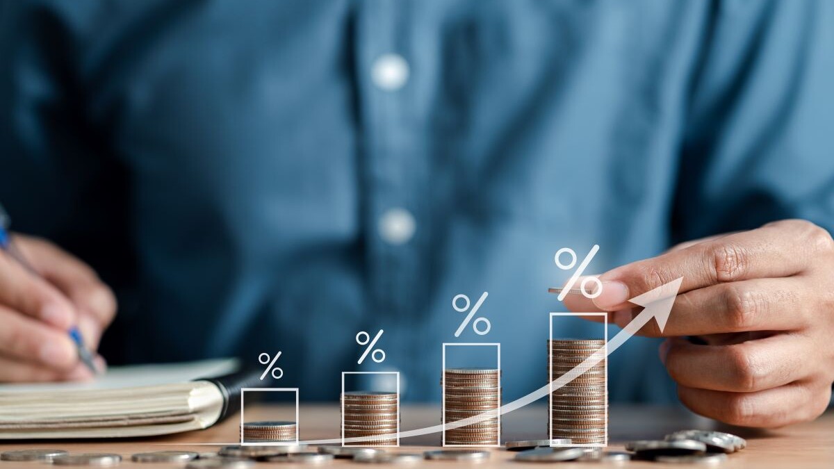 coins stacked with percentages over top