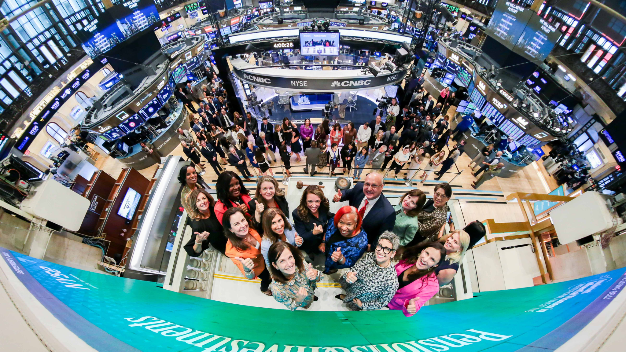 Sarah Samuels in group of women ringing the NYSE closing bell.