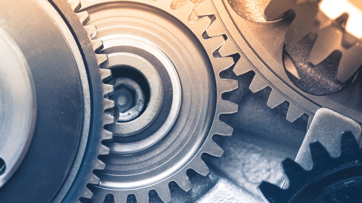 image of gears industrial background with warm shiny light