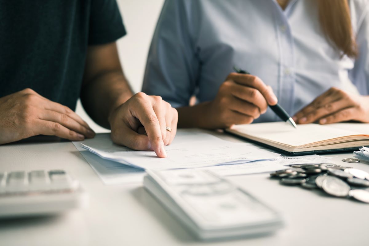 Couple analyzing expenses or finances