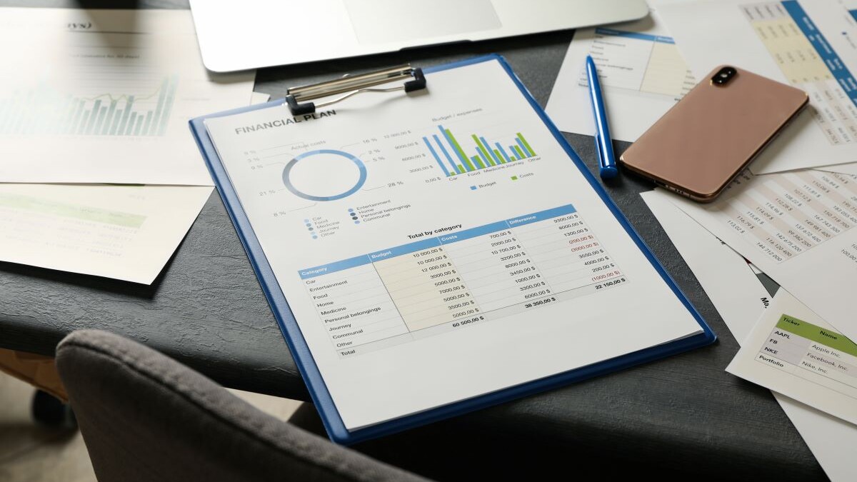 Concept of financial planning on gray wooden table