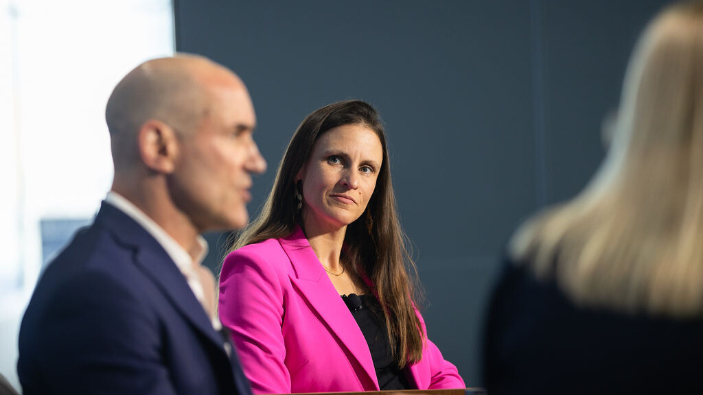 image of NEPC's Sarah Samuels on stage at the SALT conference