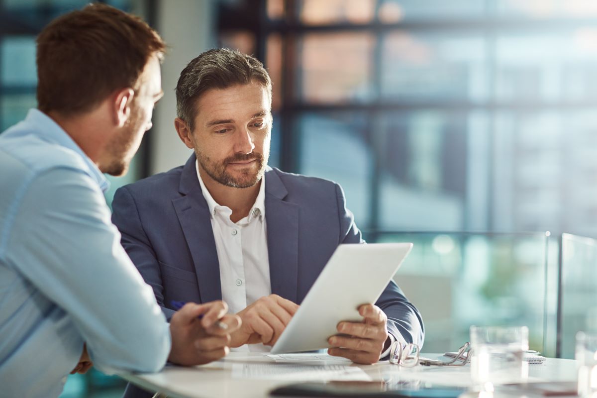 two businessmen chatting