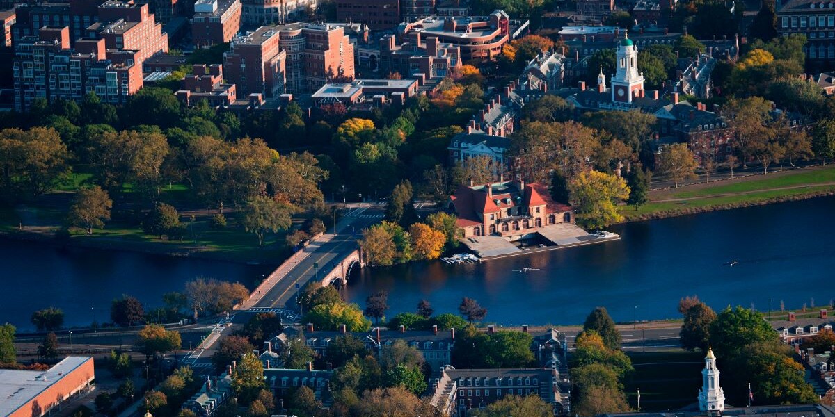 AERIAL VIEW of Cambridge and Anderson Memorial Bridge leading to Weld Boathouse, Harvard on Charles River, Cambridge, Boston, MA.