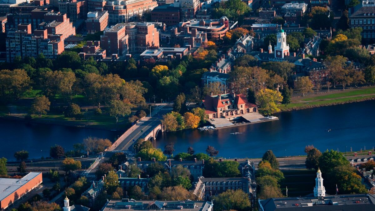 AERIAL VIEW of Cambridge and Anderson Memorial Bridge leading to Weld Boathouse, Harvard on Charles River, Cambridge, Boston, MA.