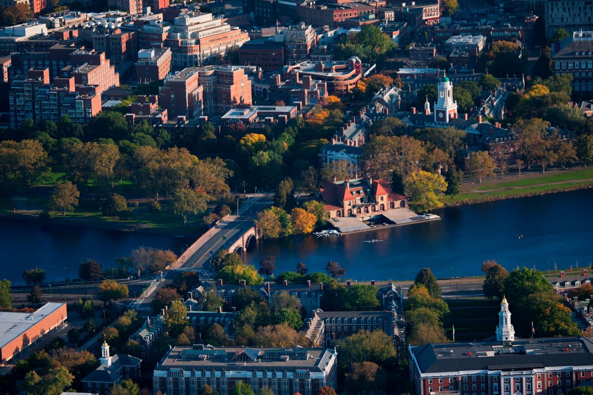 AERIAL VIEW of Cambridge and Anderson Memorial Bridge leading to Weld Boathouse, Harvard on Charles River, Cambridge, Boston, MA.
