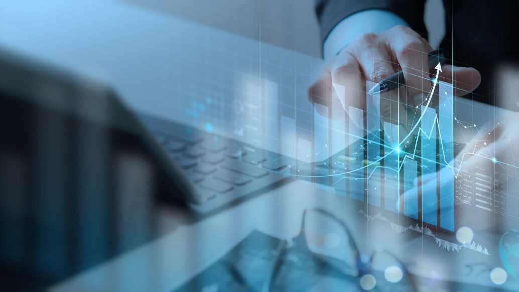 Businessman working with modern computer calculator virtual dashboard analyzing finance sales data and economic growth graph chart and account report technology.