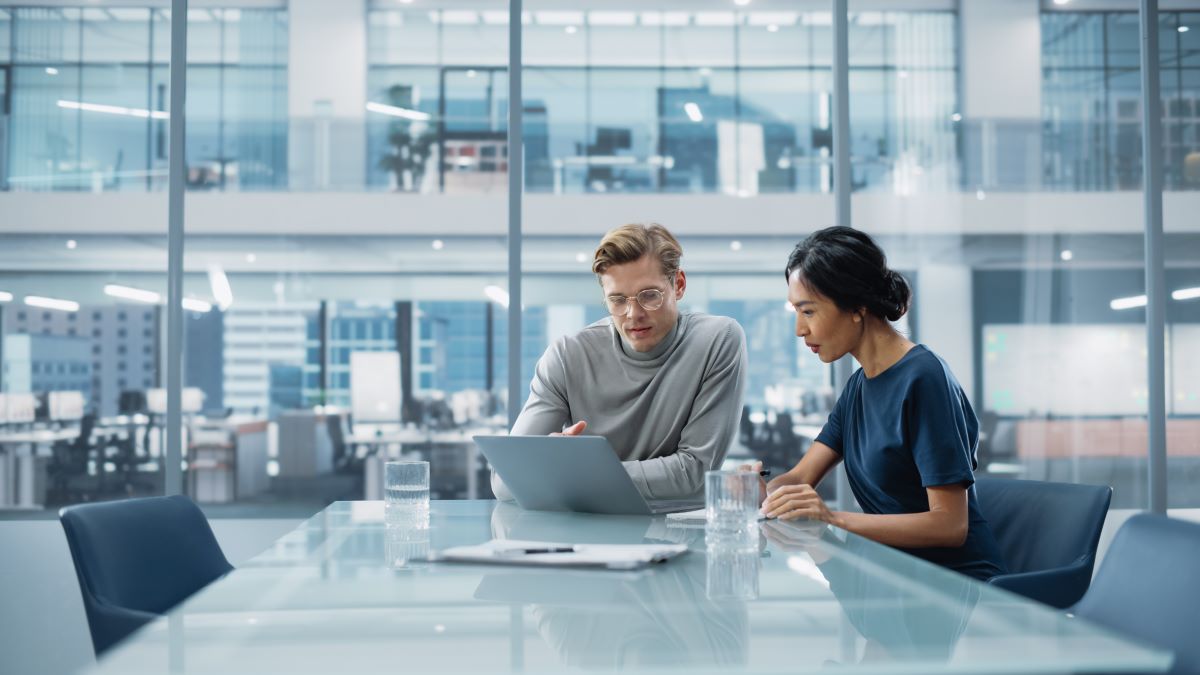 Team of Two business people Talking at desk