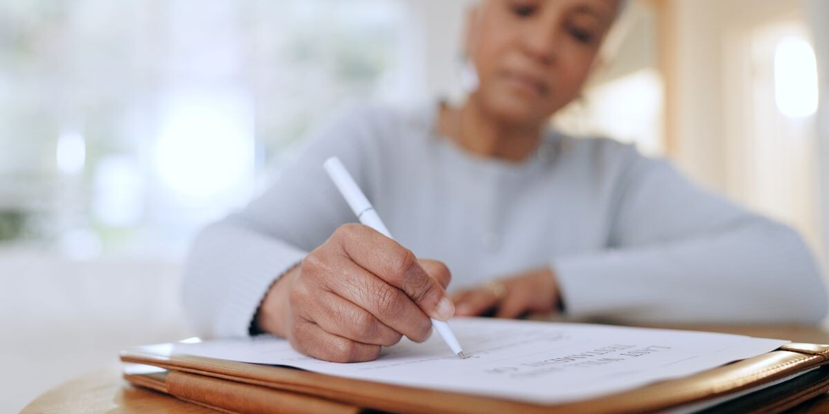Senior woman, sign and writing with documents