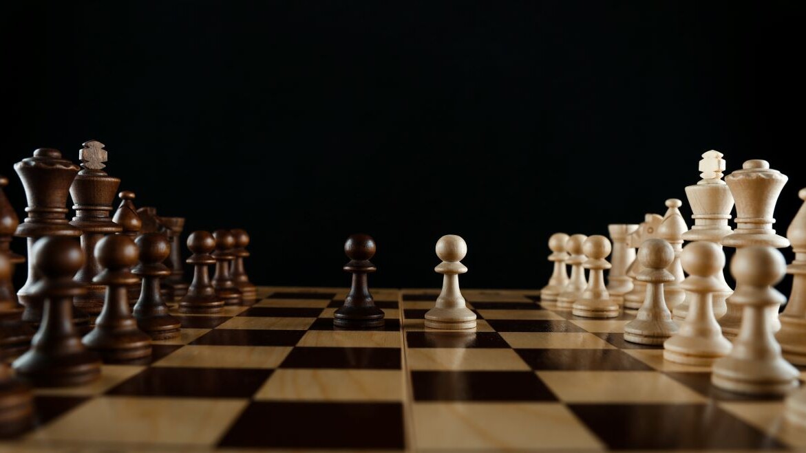 chess pieces on black background